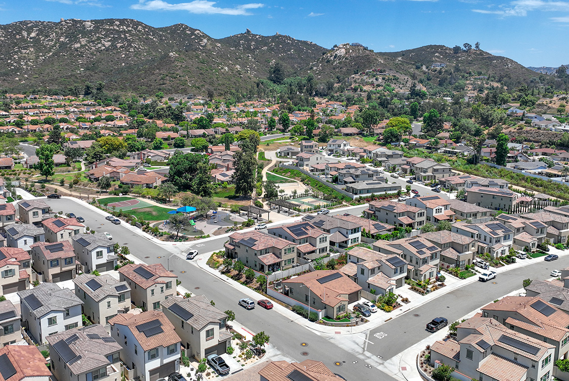 aerial view of houses with solar panels